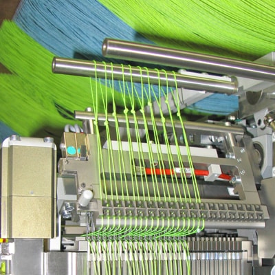 Loom for harness cord assembly